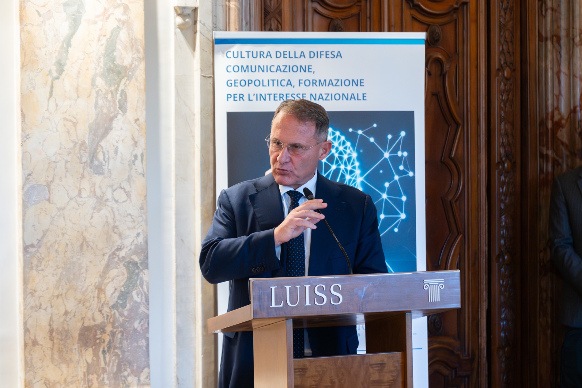 Intervento al podio presso la Sala delle Colonne